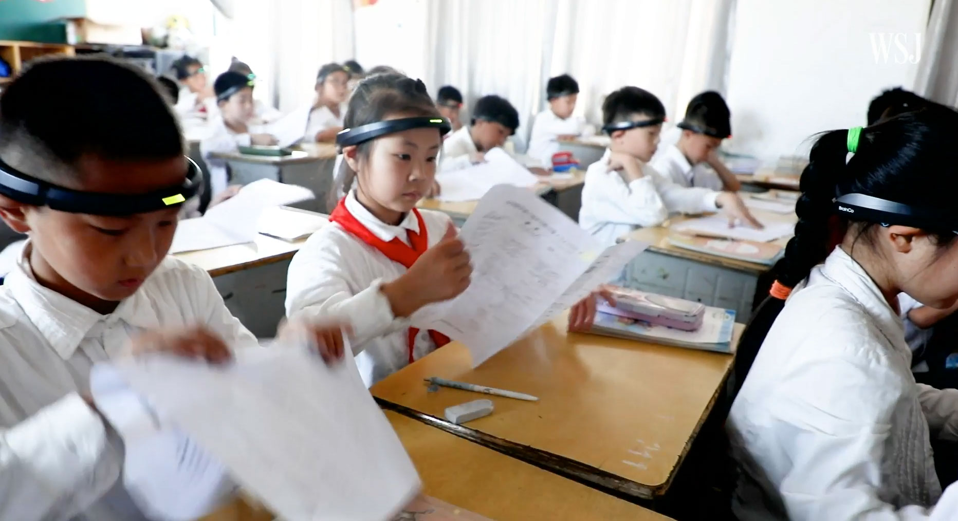 AI监控走进中国小学课堂，头戴脑波仪能提高孩子成绩？